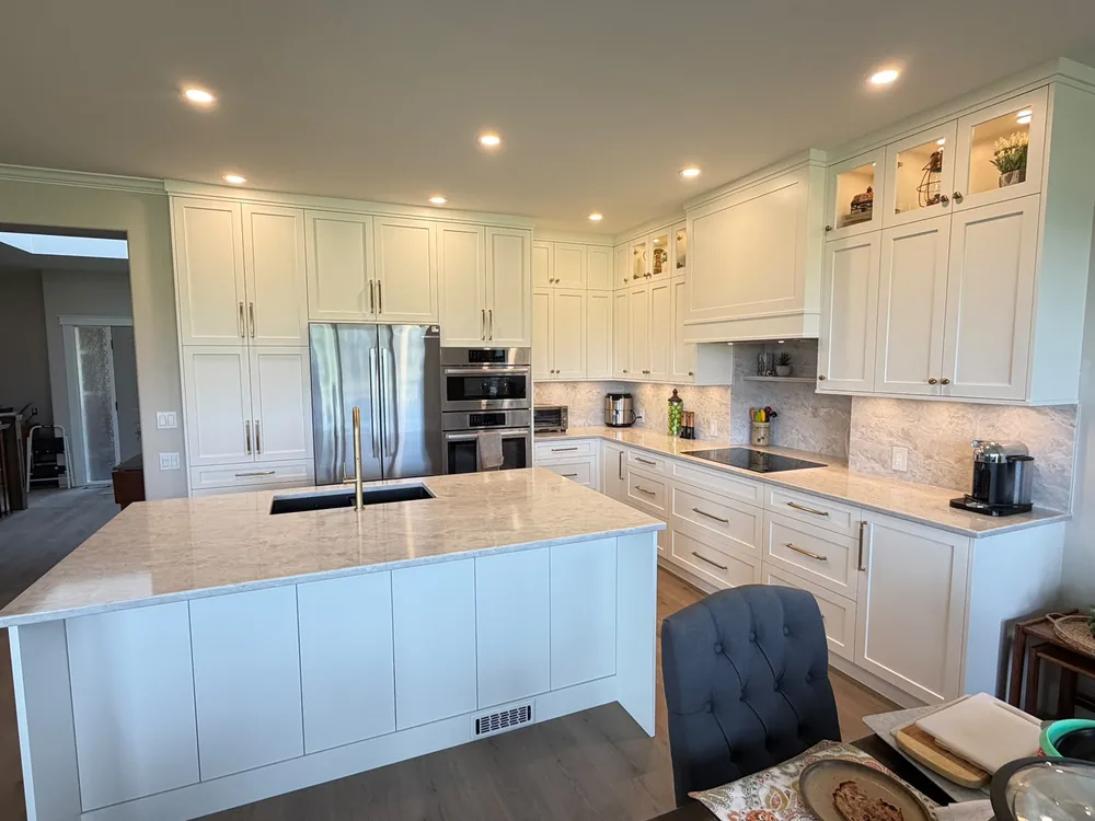 Kelowna kitchen looking toward the cooking wall after the renovation by Amend Developments