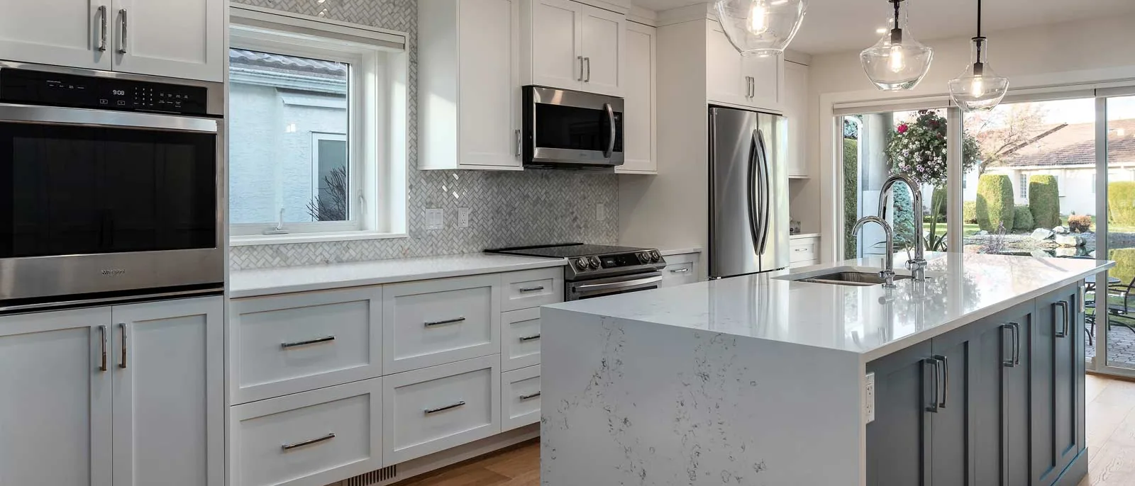 Custom kitchen and living room by Amend Developments